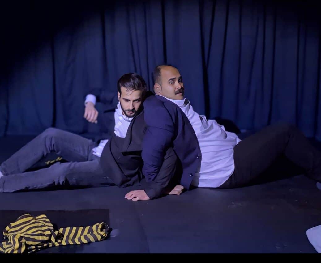 two artist men are performing