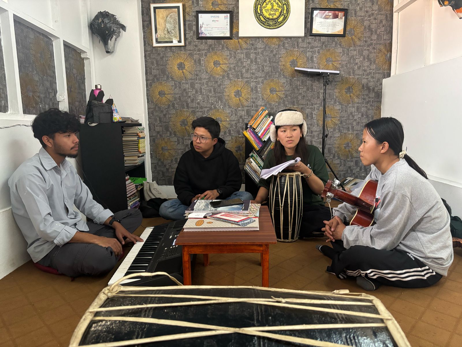 artist are thinking and holding musical instruments