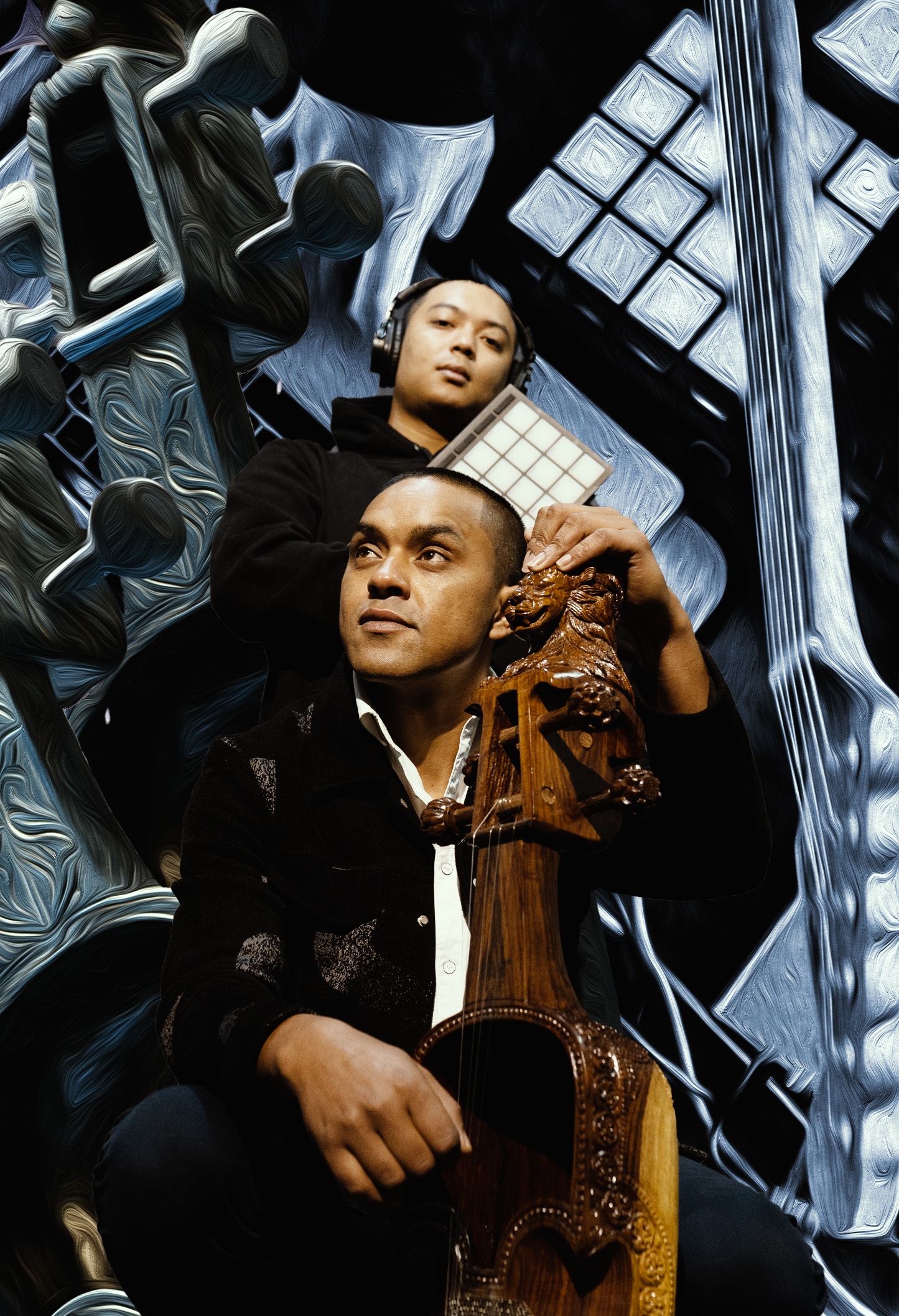 two people are holding sarangi instrument