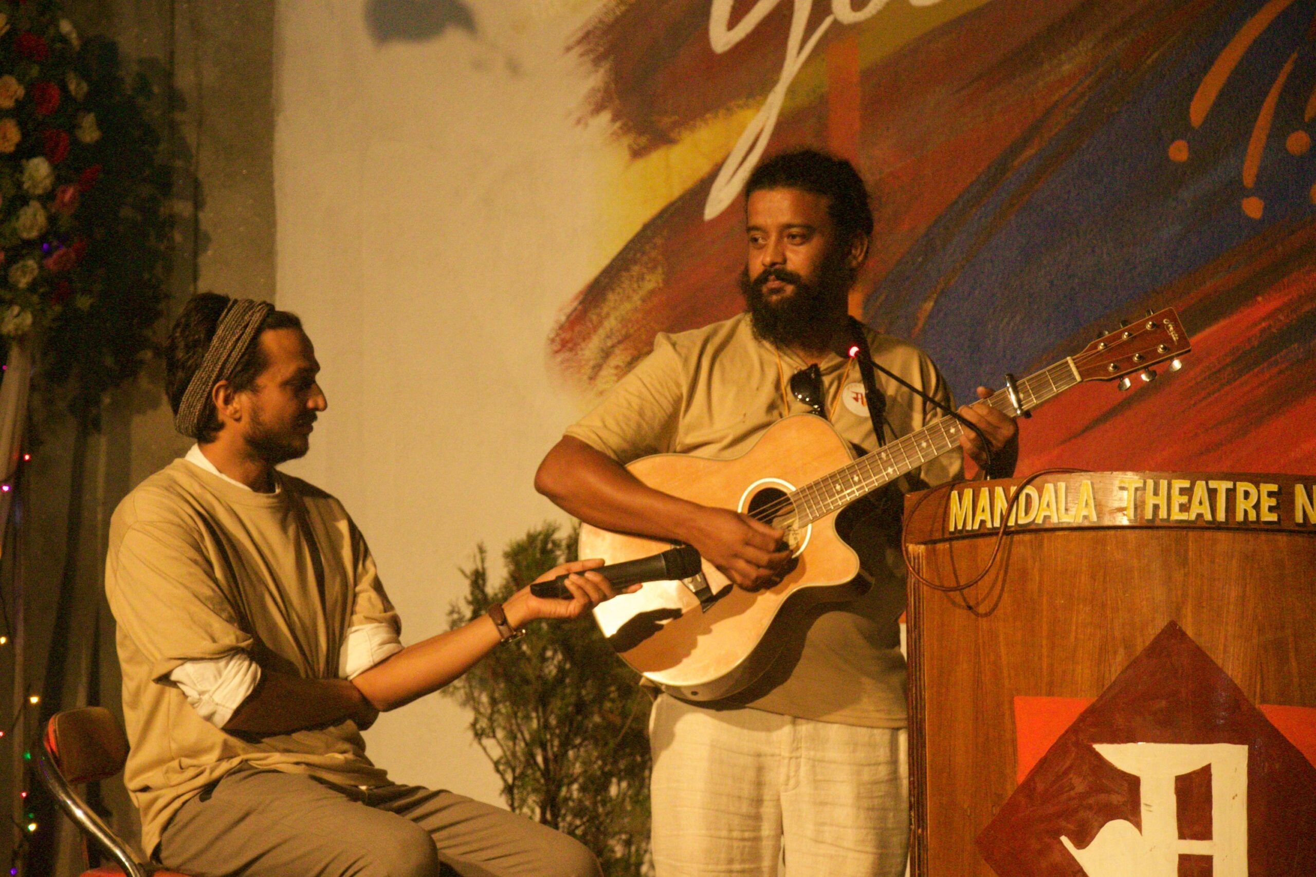 guitar played by artist at mandala theatre nepal